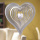 Edelstahl 3d Windspiel Love mit Kristallherz 17 cm